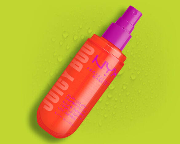 NYX Professional Makeup Hair & Body Fragrance Mist in Juicy Boo with a textured oil behind the packshot.