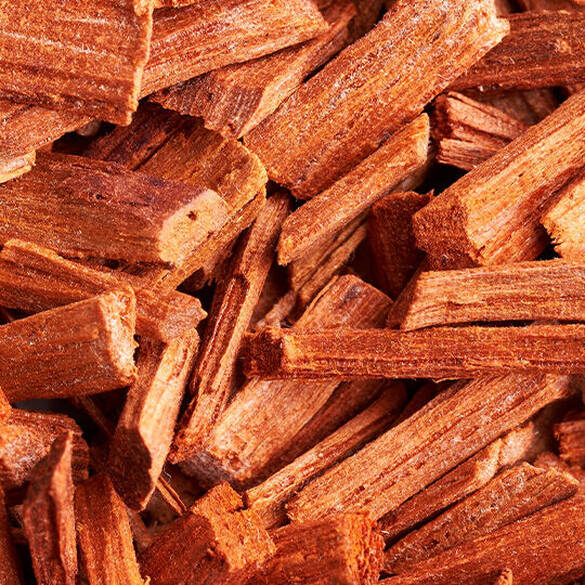 NYX Professional Makeup Juicy Boo Hair & Body Fragrance Mist scent bottom notes cedarwood chips illustrating bottom notes of cedarwood, sandalwood, and bright musks.
